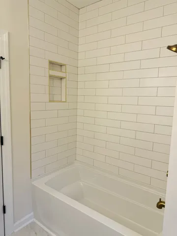 a bathroom with a bathtub