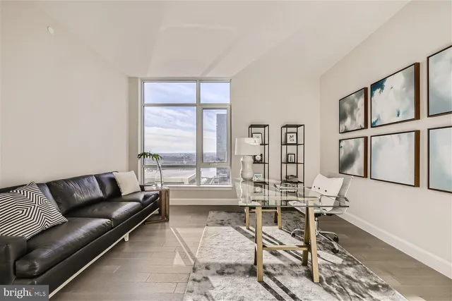 a bathroom with a double vanity sink mirror and shower