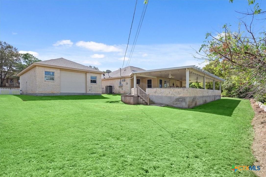 5943 Gavin Ridge Road Belton, TX 76513 - Photo 27 of 28 Detached garage features a roll up door on the back side.