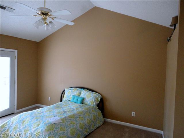 3306 Timberwolf Avenue High Point, NC 27265 - Photo 11 of 16 Master Bedroom. Master Bedroom provides access to rear multi-tiered deck