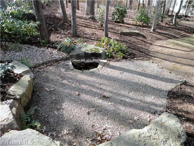 3306 Timberwolf Avenue High Point, NC 27265 - Photo 5 of 16 Landscaping. Fire Pit Area