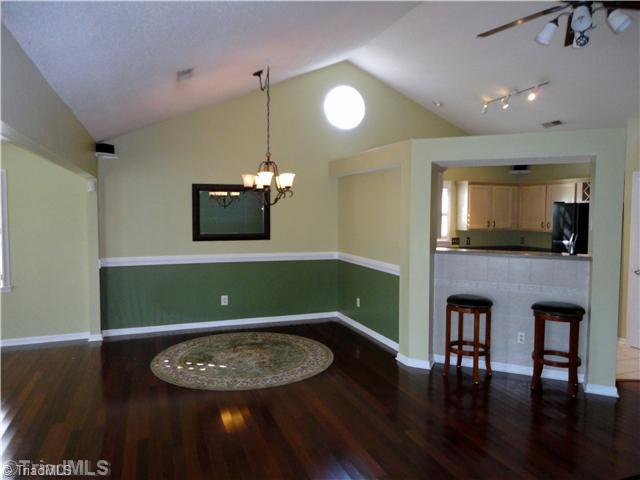3306 Timberwolf Avenue High Point, NC 27265 - Photo 8 of 16 Dining Room. Dining Room is conveniently located next to the combination breakfast bar & pass-thru from the kitchen