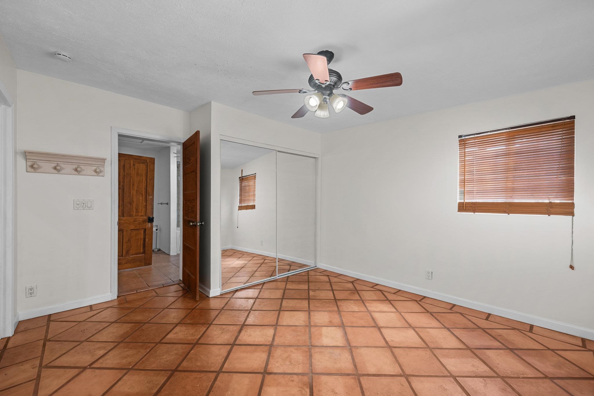 815 Kuulei Street Haiku, HI 96708 - Photo 10 of 26 a view of an empty room and window