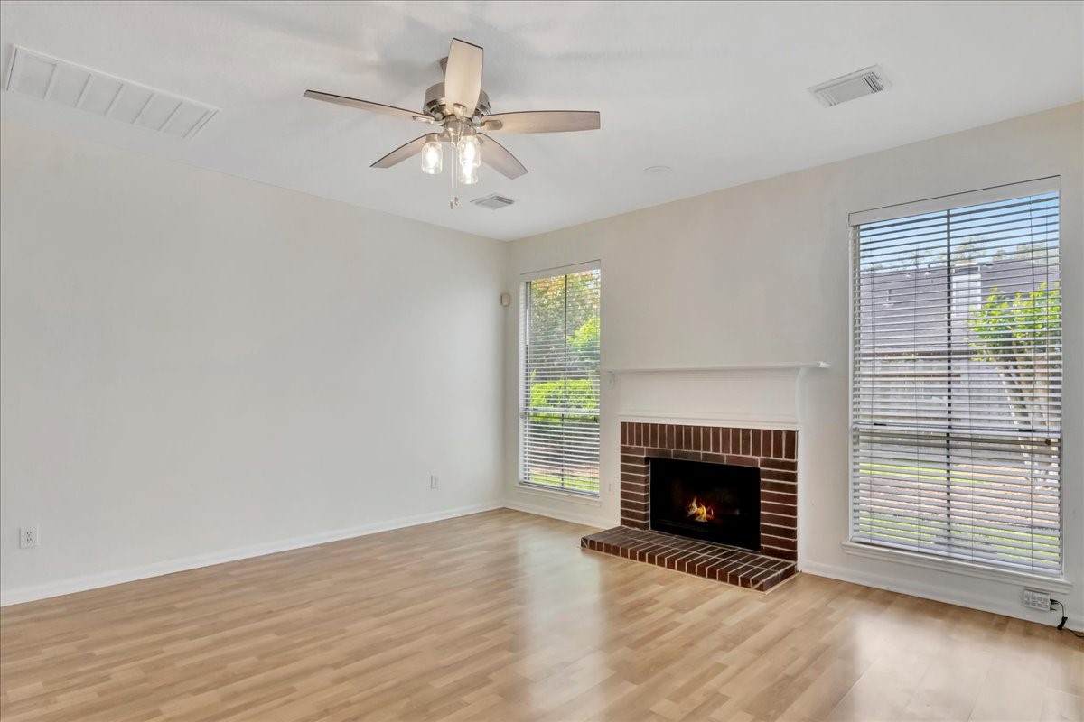 14010 Hazel Ridge Court Houston, TX 77062 - Photo 11 of 38 Lovely featured fireplace in family room.