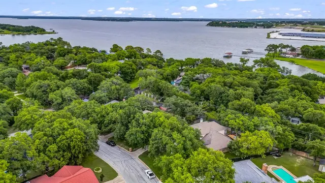 a view of a lake with a building in the background