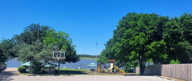 a view of a park with swings