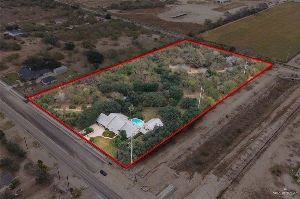 9800 North Shary Road Mission, TX 78573 - Photo 7 of 10 a view of a back yard of a house