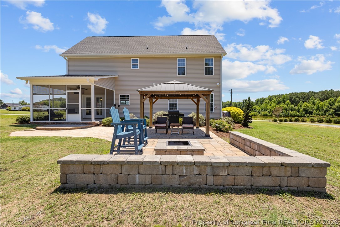 137 Minter School Road Sanford, NC 27332 - Photo 44 of 50 a view of house with outdoor space