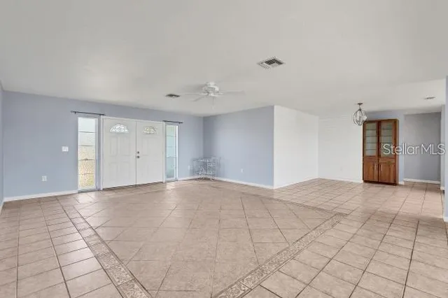 a kitchen with a sink stove and refrigerator