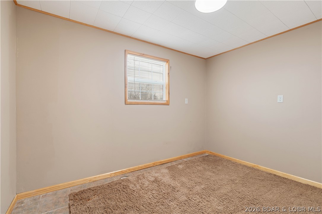 31048 Broken Circle Road Stover, MO 65078 - Photo 19 of 59 Non-conforming lower level/main level bedroom. Jus