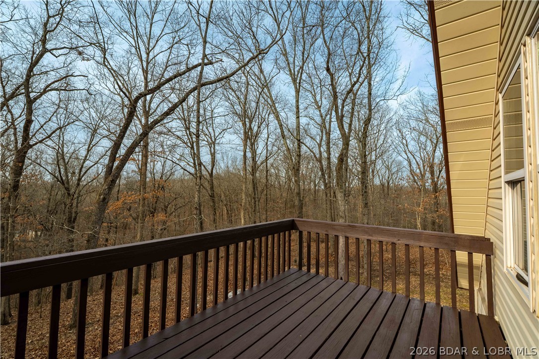 31048 Broken Circle Road Stover, MO 65078 - Photo 27 of 59 Upper level deck just had deck boards replaced & s