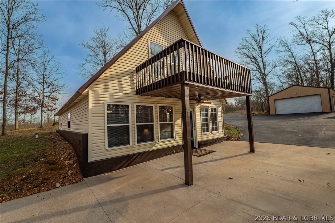 31048 Broken Circle Road Stover, MO 65078 - Photo 30 of 59 Lower level patio can easily be enclosed to create