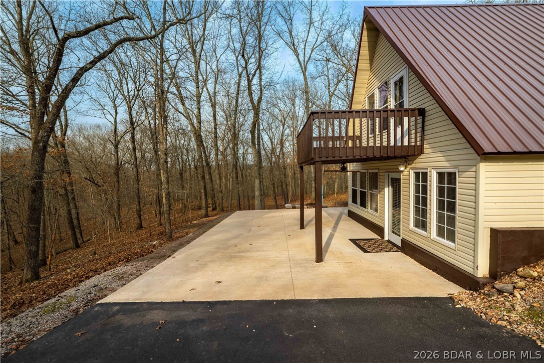 31048 Broken Circle Road Stover, MO 65078 - Photo 32 of 59 Fire pit is located just off the patio for s'mores