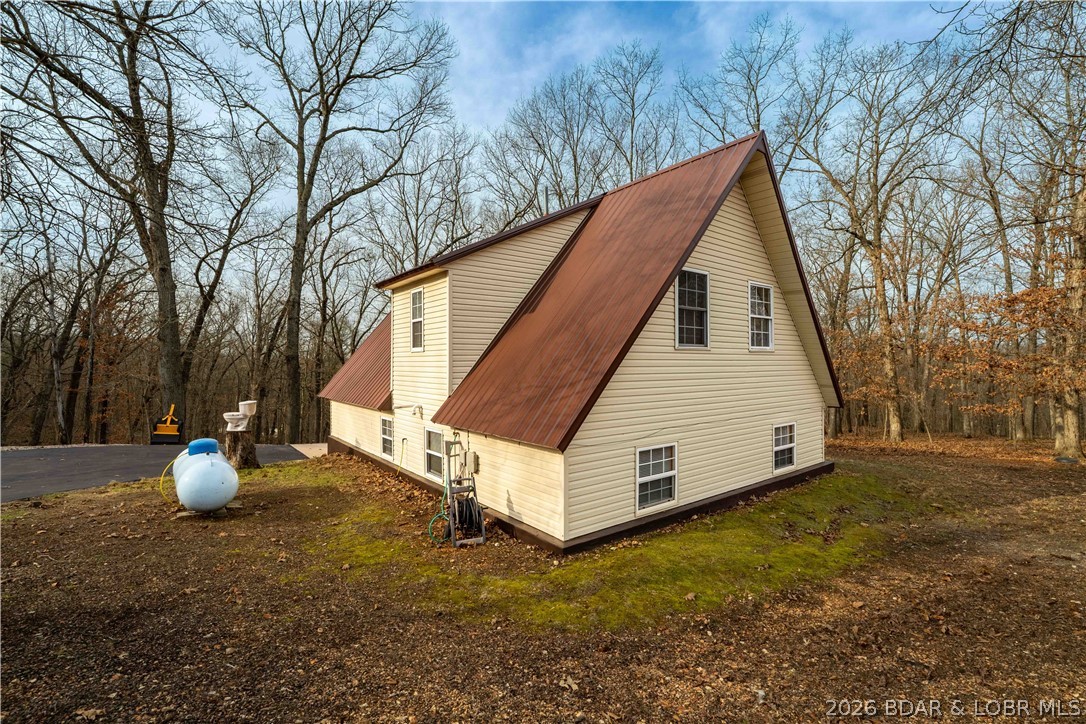 31048 Broken Circle Road Stover, MO 65078 - Photo 35 of 59 Easy to maintain & gentle yard.