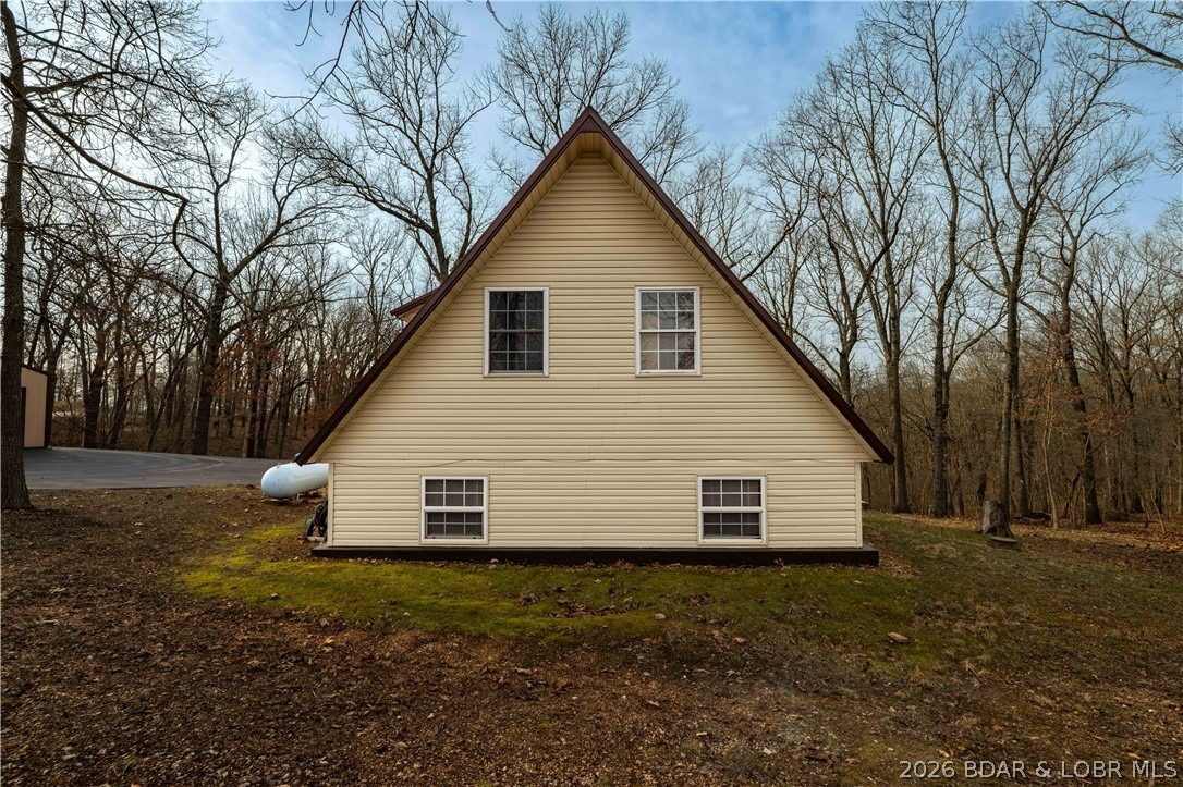 31048 Broken Circle Road Stover, MO 65078 - Photo 36 of 59 Plenty of open space to create a raised garden on