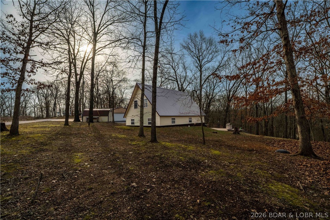 31048 Broken Circle Road Stover, MO 65078 - Photo 37 of 59 Tucked in the woods on nearly 5 acres, this home i