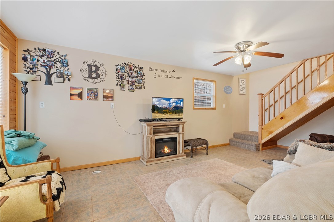 31048 Broken Circle Road Stover, MO 65078 - Photo 5 of 59 Curl up in front of your electric fireplace in the