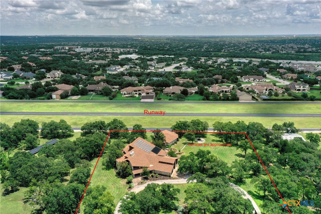 700 Breakaway Road Cedar Park, TX 78613 - Photo 30 of 38 Aerial view of house looking towards runway