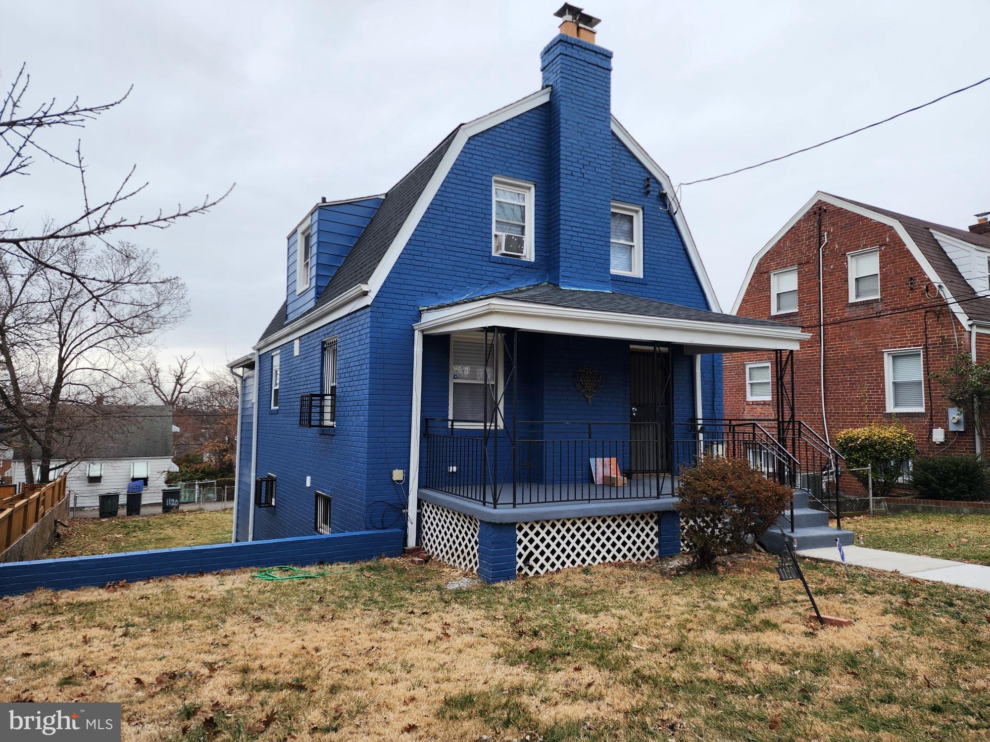 1120 44th Place Southeast Washington, DC 20019 - Photo 1 of 31 a front view of a house with garden