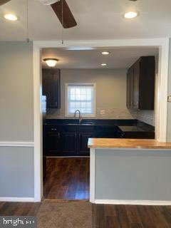 1120 44th Place Southeast Washington, DC 20019 - Photo 11 of 31 a kitchen with stainless steel appliances granite countertop a refrigerator and a sink