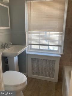 1120 44th Place Southeast Washington, DC 20019 - Photo 15 of 31 a bathroom with a toilet and a sink