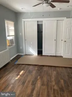 a view of outdoor space with wooden floor