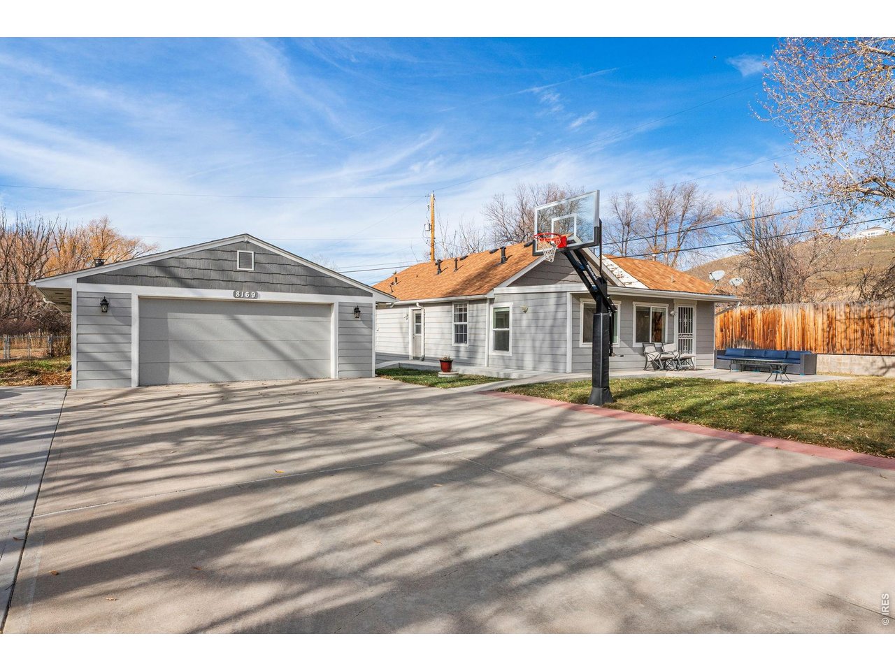 8169 Quaker Street Arvada, CO 80007 - Photo 2 of 20 Large Detached Garage and additional drive through storage/RV Parking
