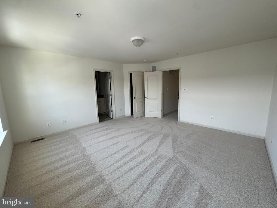 7805 Cherrel Brooks Way Elkridge, MD 21075 - Photo 52 of 62 a view of an empty room