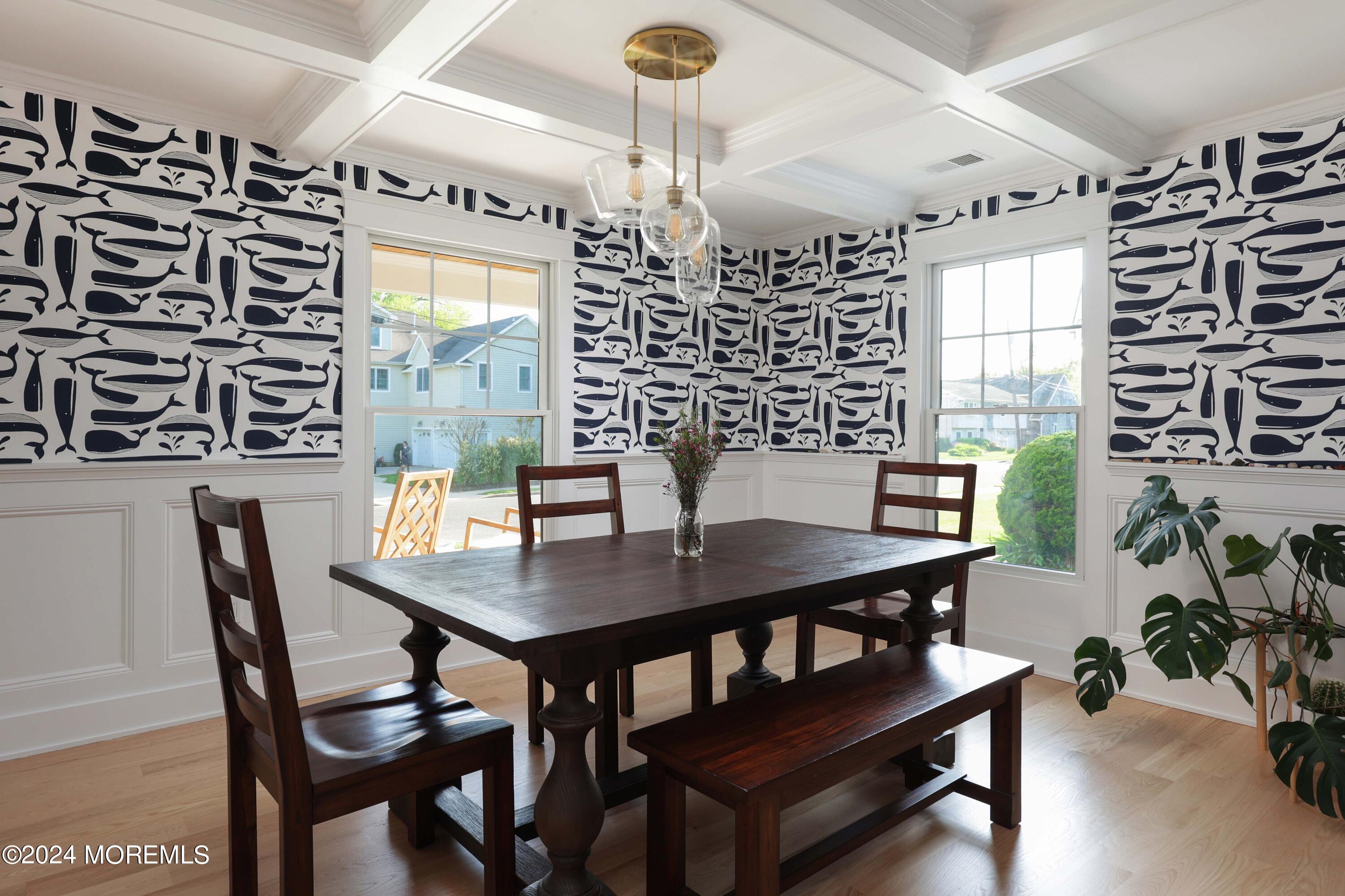 408 Central Avenue Spring Lake, NJ 07762 - Photo 11 of 46 a view of a dining room with furniture and wooden floor