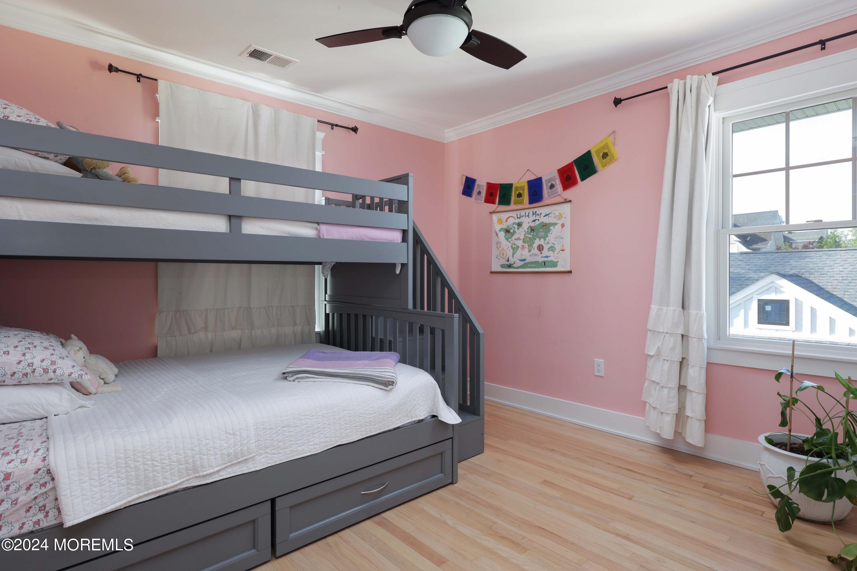 408 Central Avenue Spring Lake, NJ 07762 - Photo 23 of 46 a bedroom with a bed and a window