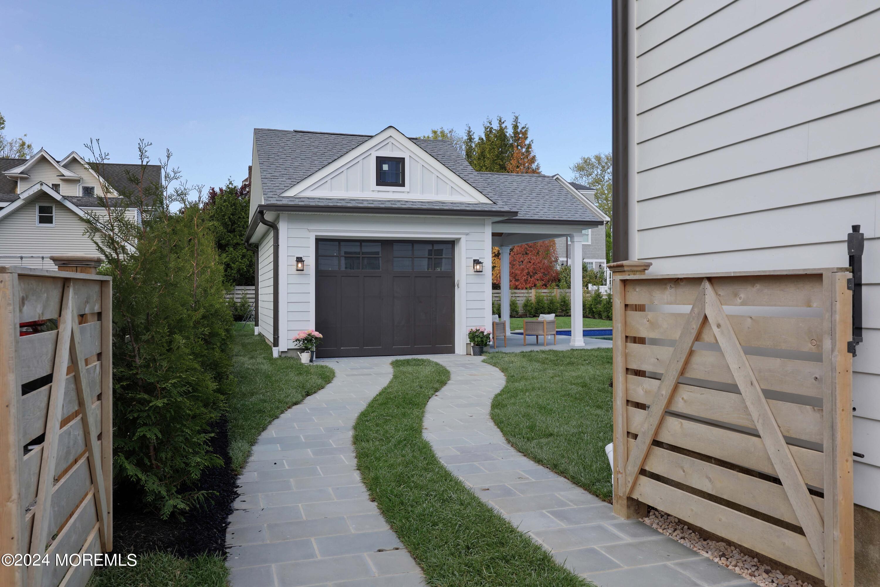 408 Central Avenue Spring Lake, NJ 07762 - Photo 30 of 46 a front view of a house with a yard