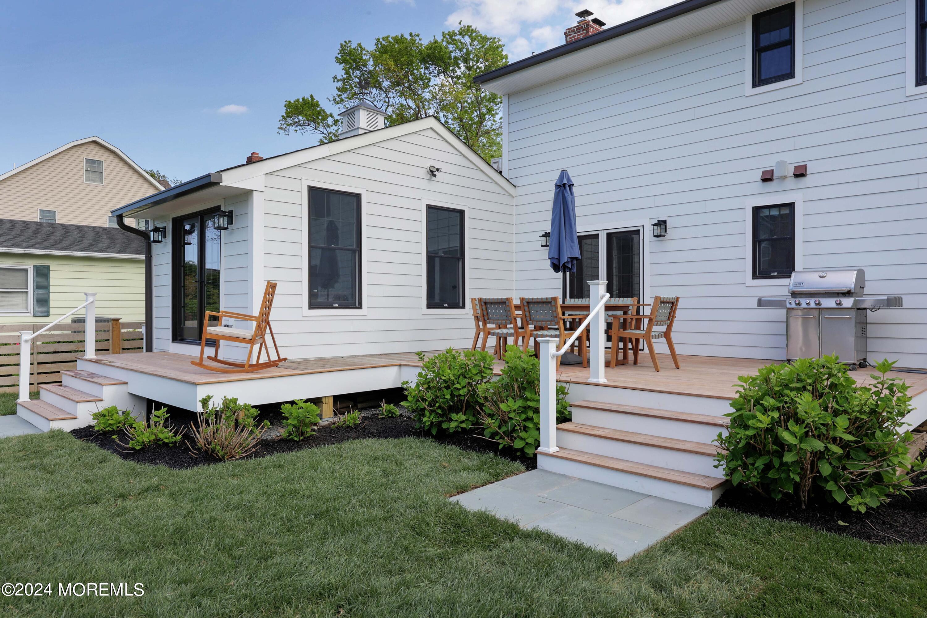 408 Central Avenue Spring Lake, NJ 07762 - Photo 31 of 46 a front view of house with a garden