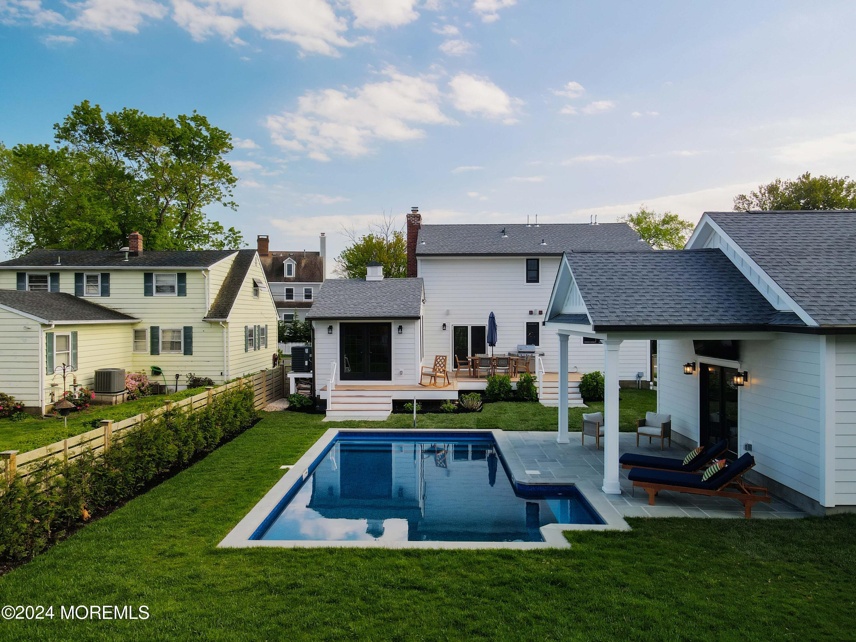 408 Central Avenue Spring Lake, NJ 07762 - Photo 43 of 46 a front view of house with yard and outdoor seating