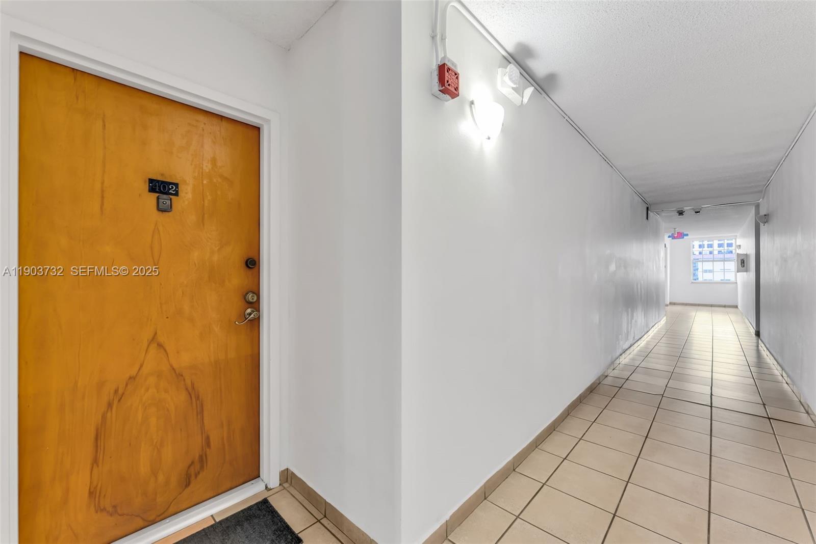 3661 Southwest 9th Terrace, Unit 402 Miami, FL 33135 - Photo 2 of 15 a view of gallery with window