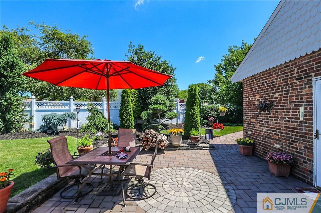 1 Stevens Road Edison, NJ 08817 - Photo 22 of 24 a view of a backyard with sitting area