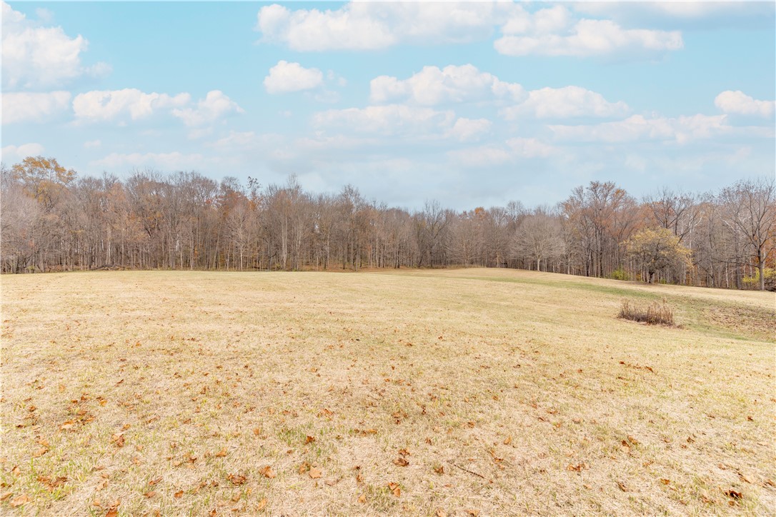 18333 Lefevre Number 2 Road Sidney, OH 45365 - Photo 23 of 25 Expansive green space offers serene views and endless possibilities for outdoor enjoyment.