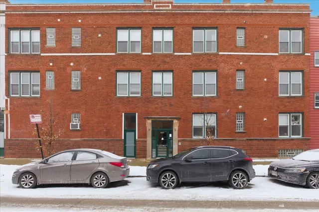 a car parked in front of a building