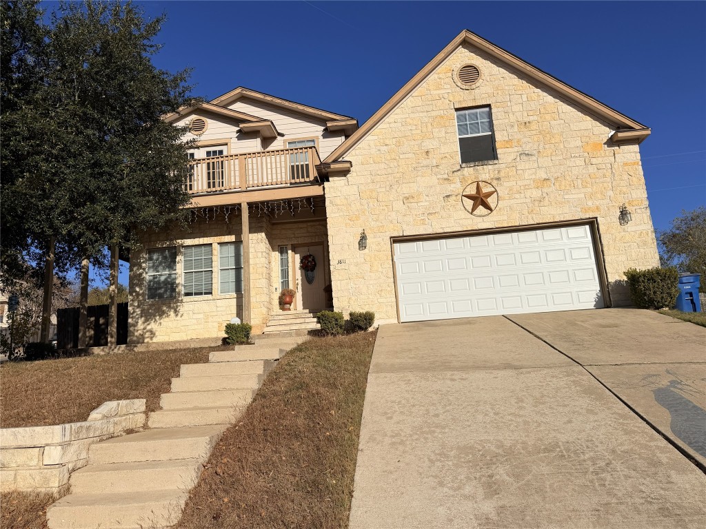 3811 Hawk View Street Round Rock, TX 78665 - Photo 1 of 6 a front view of a house with a yard