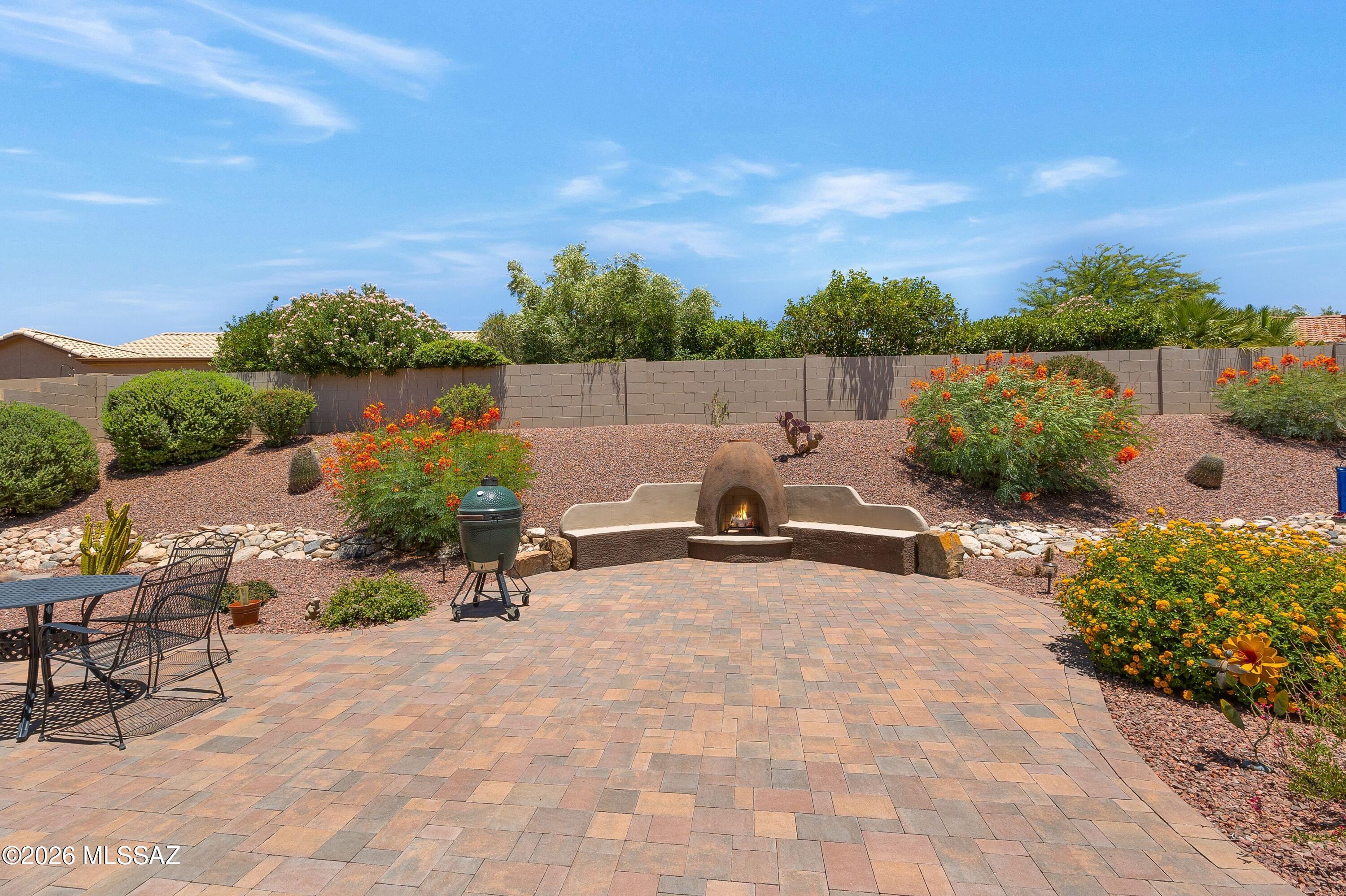 61852 East Sandlewood Road Tucson, AZ 85739 - Photo 38 of 50 Gather around the Beehive Fireplace