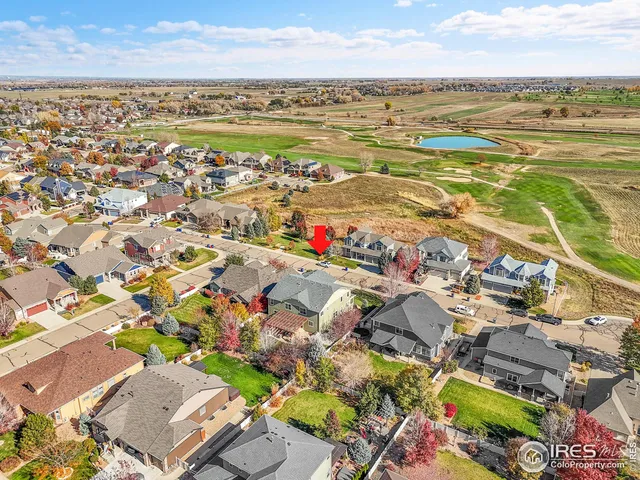 an aerial view of residential building and ocean