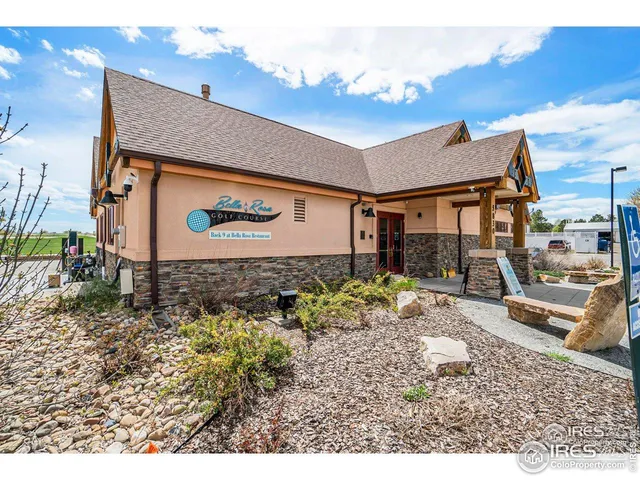 a view of a lake and yard