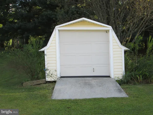 a front view of a house with a glass door