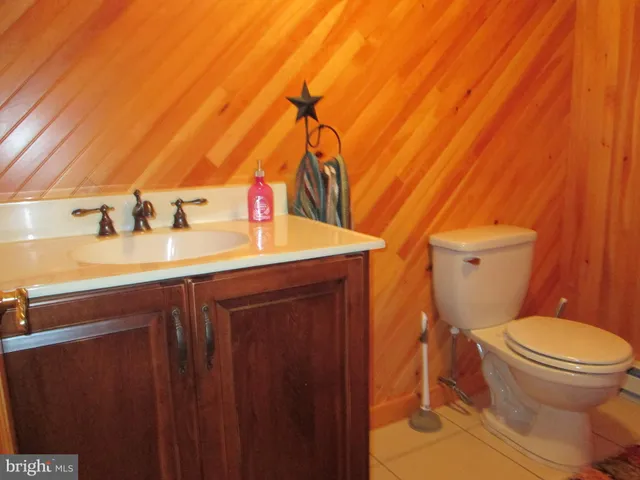 a bedroom with a bed and a shower