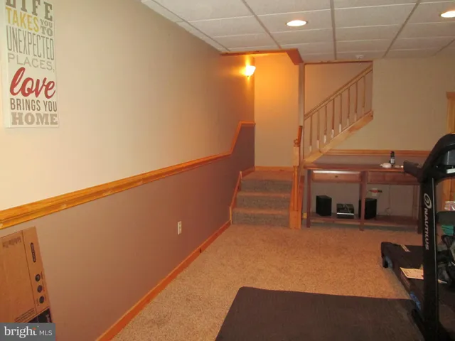 a workspace with furniture and a window