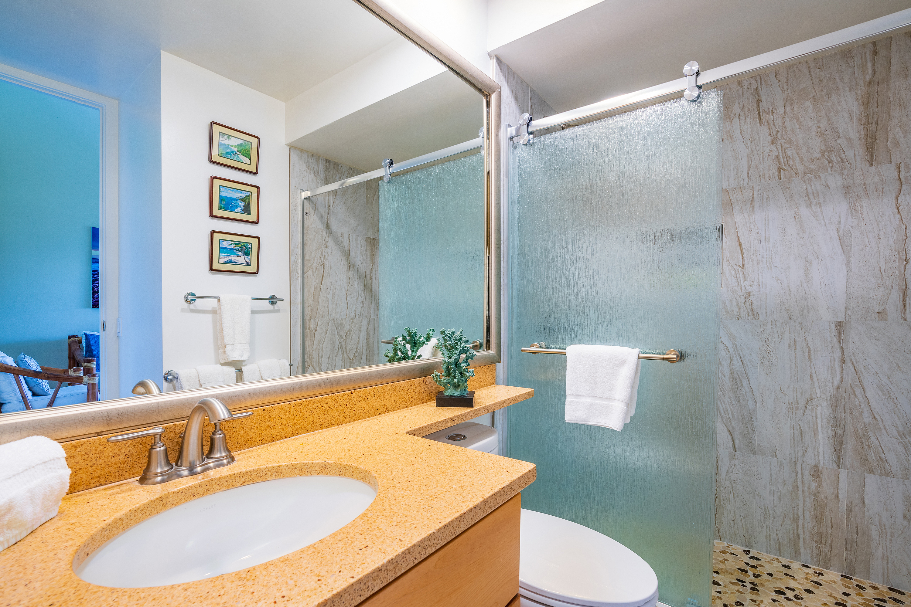 3811 Edward Road, Unit 2309 Princeville, HI 96722 - Photo 12 of 27 a bathroom with a sink and a mirror