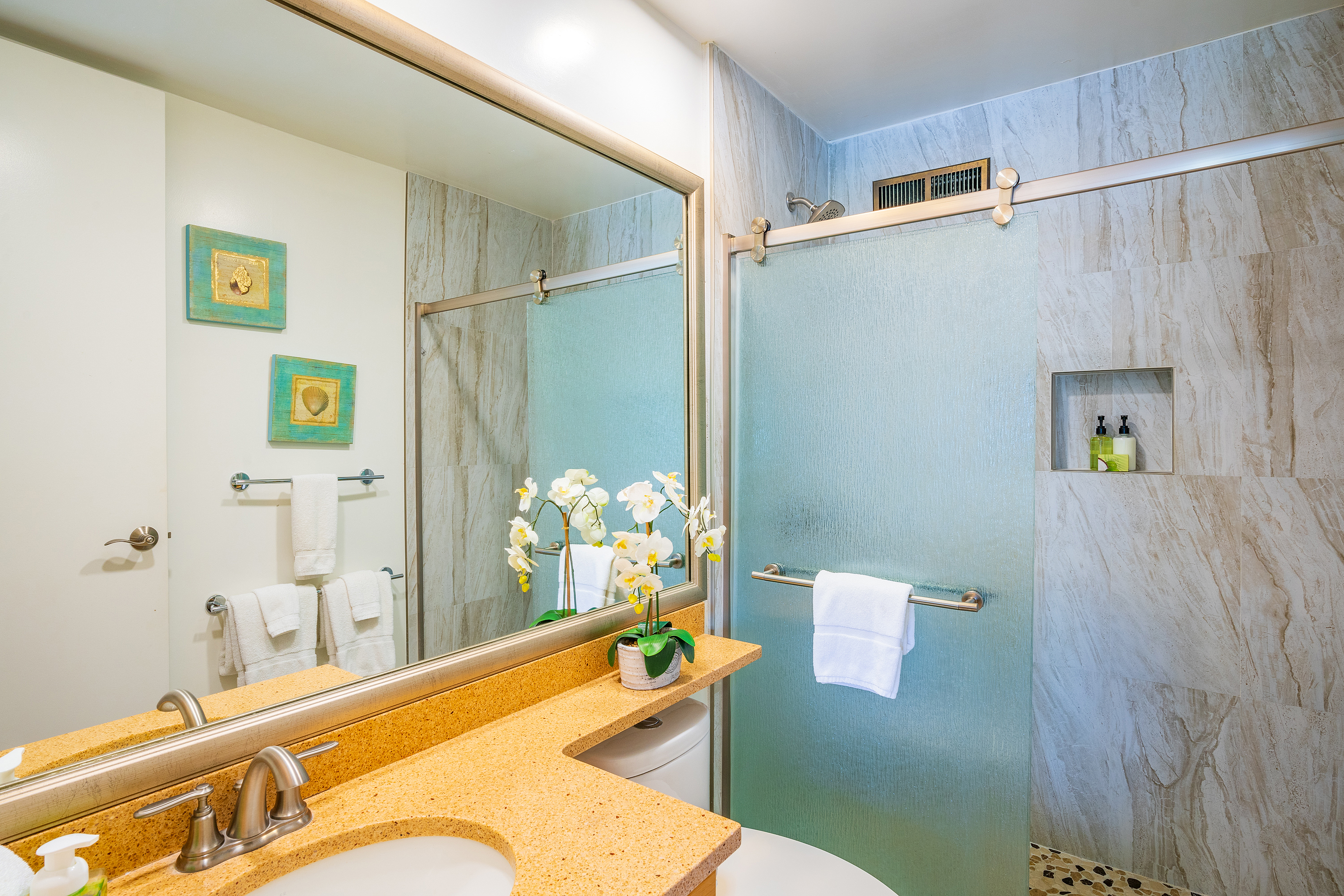 3811 Edward Road, Unit 2309 Princeville, HI 96722 - Photo 16 of 27 a room with a table and chairs