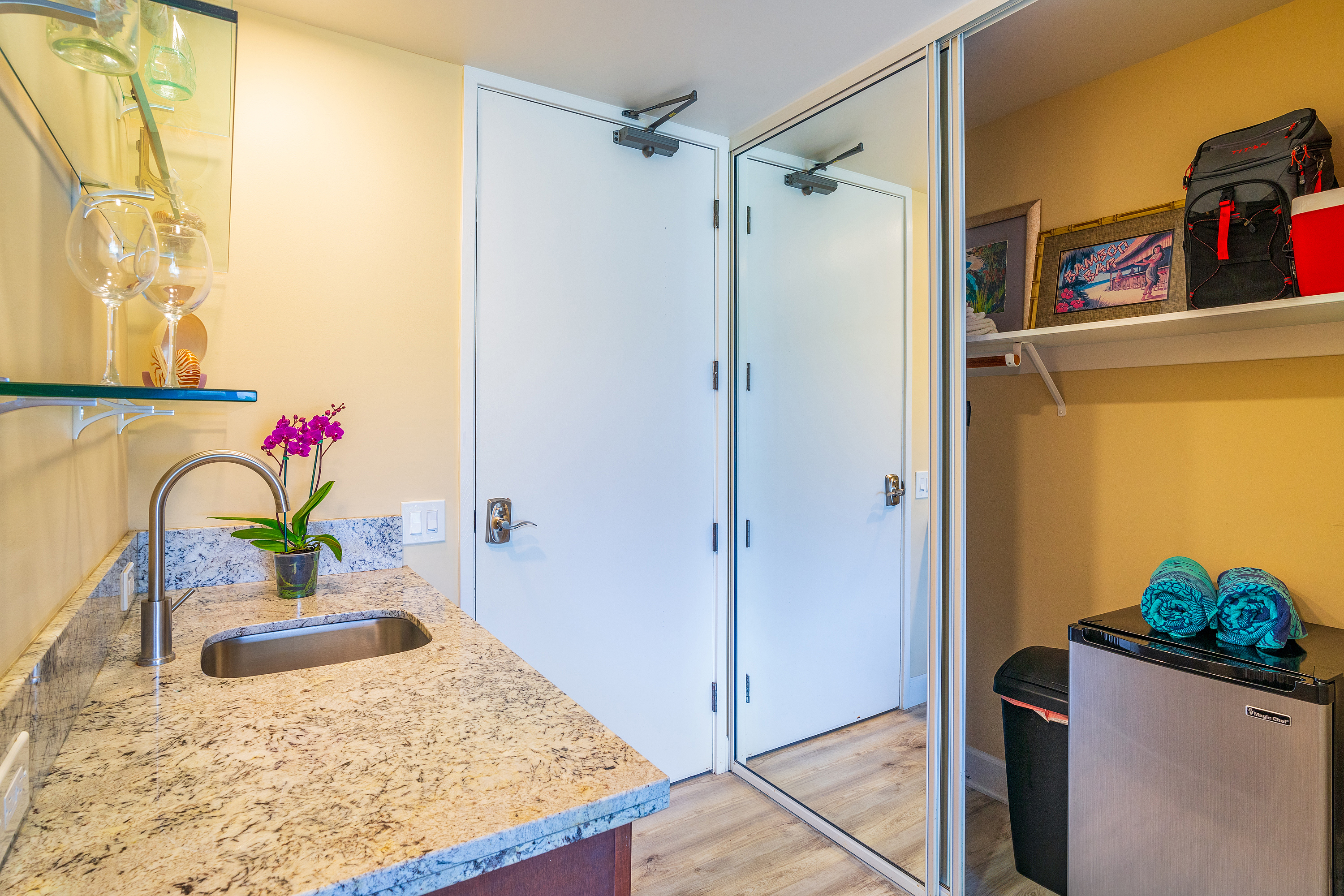 3811 Edward Road, Unit 2309 Princeville, HI 96722 - Photo 18 of 27 a bathroom with a tub sink and a shower