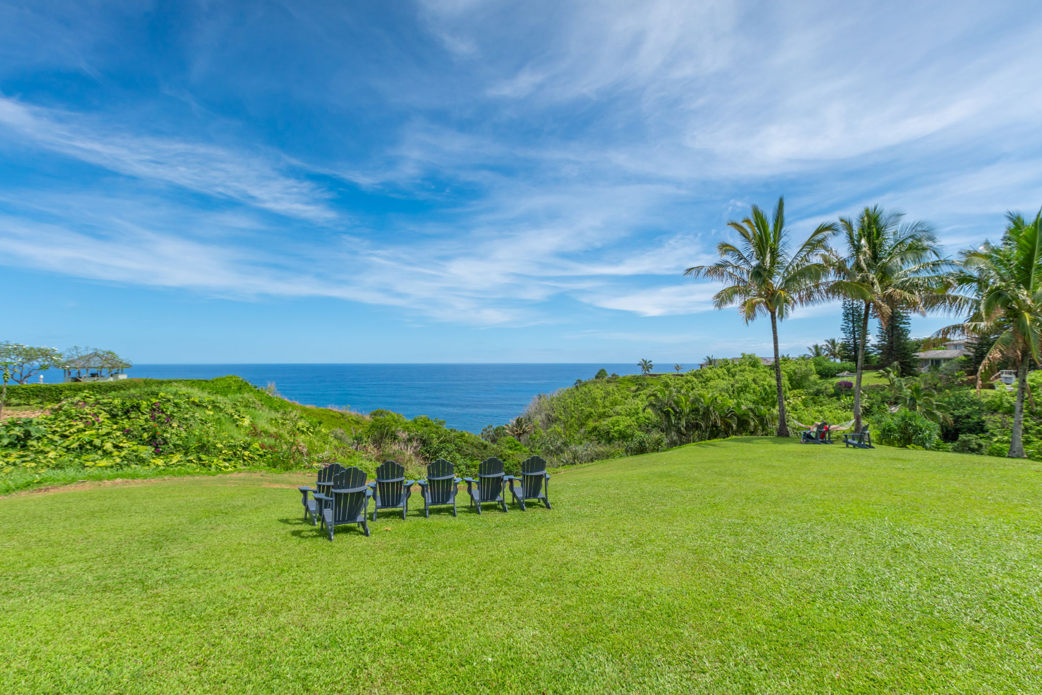3811 Edward Road, Unit 2309 Princeville, HI 96722 - Photo 23 of 27 a view of a garden with a building in the background