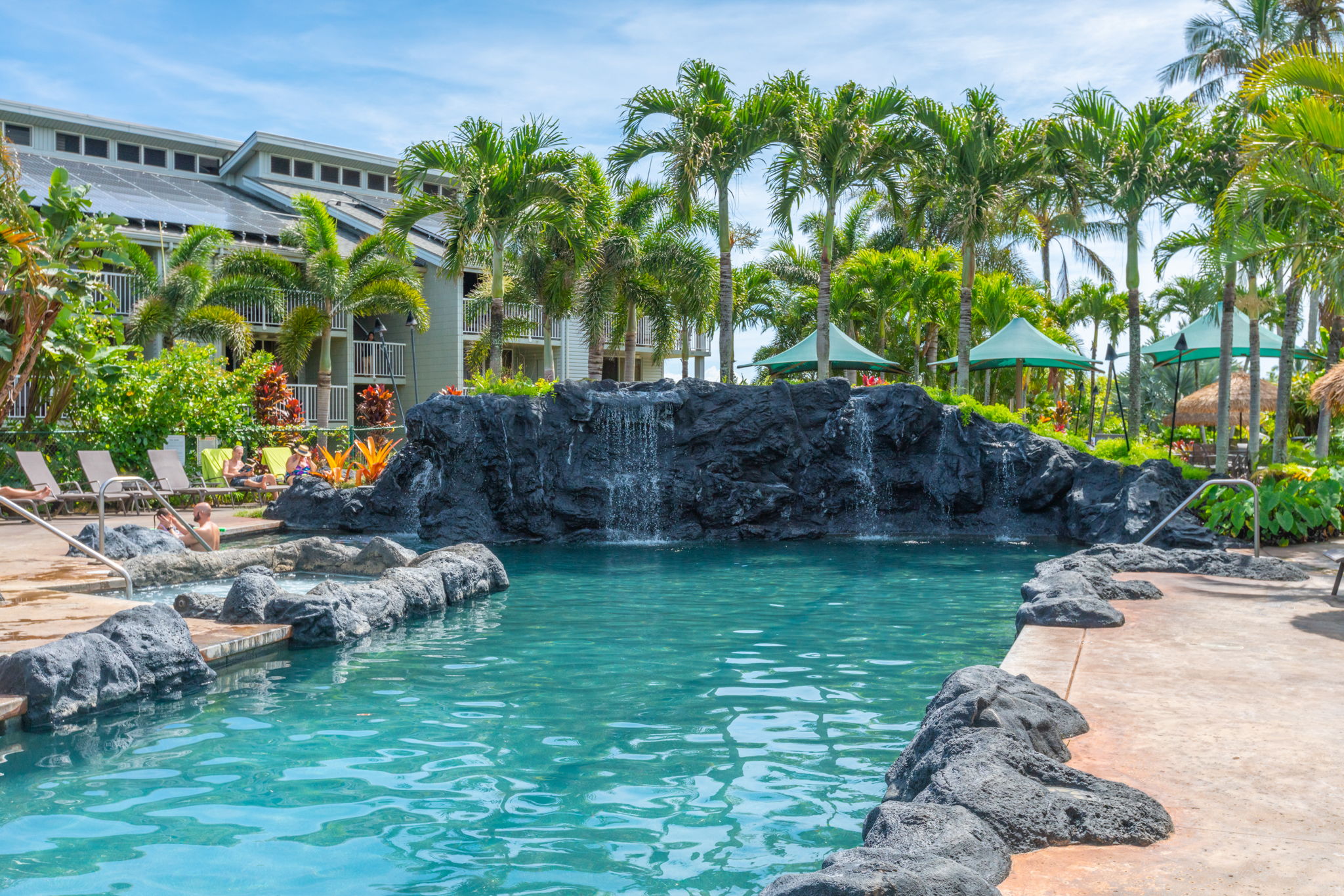 3811 Edward Road, Unit 2309 Princeville, HI 96722 - Photo 25 of 27 a backyard of a house with lots of green space
