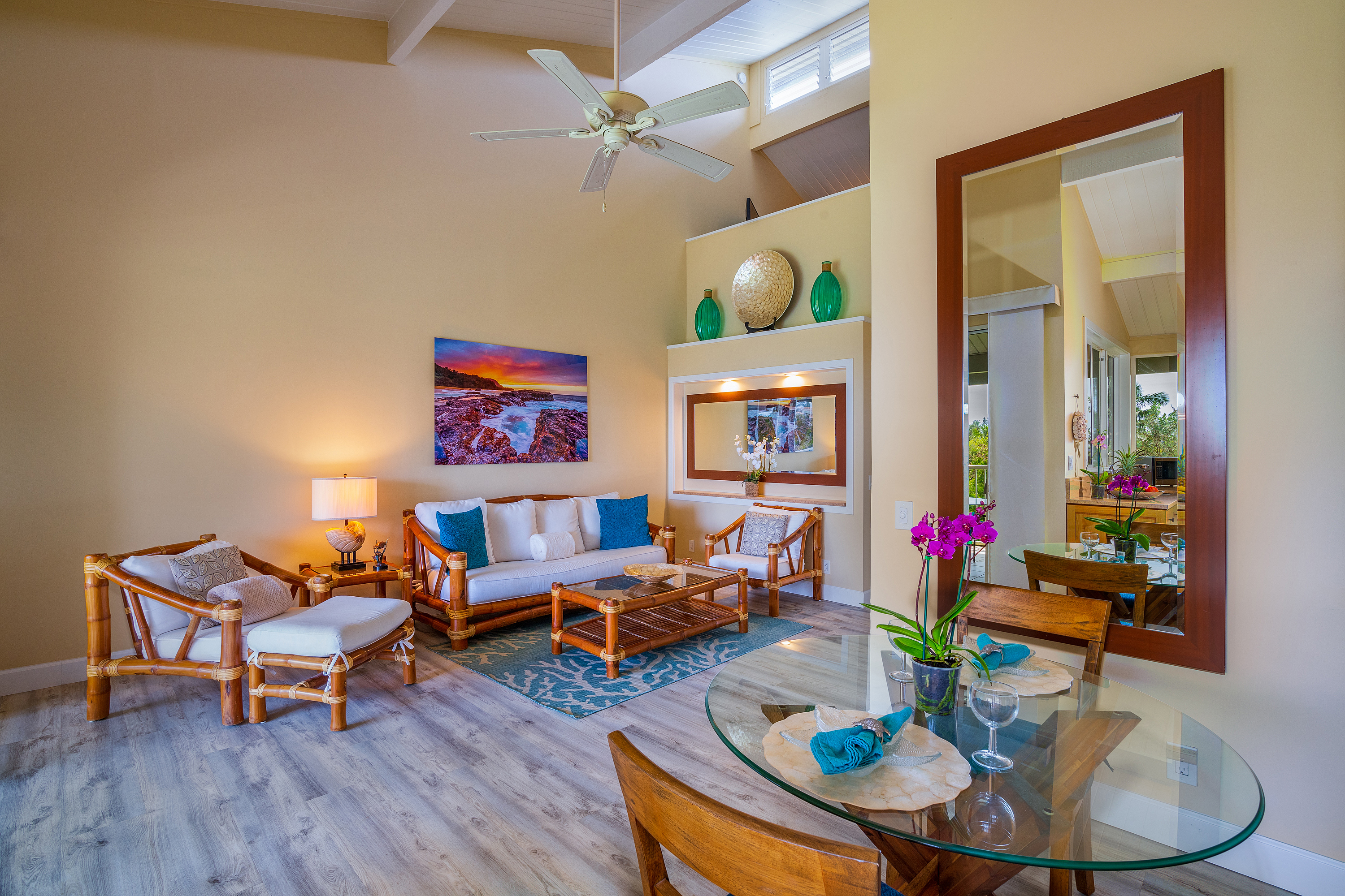 3811 Edward Road, Unit 2309 Princeville, HI 96722 - Photo 4 of 27 a living room with furniture and wooden floor